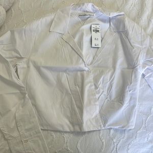 Very cute and new white blouse